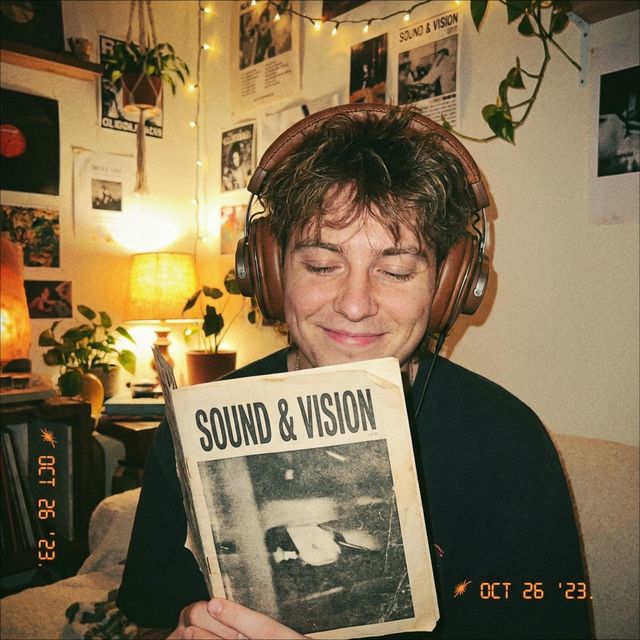 Listener with headphones